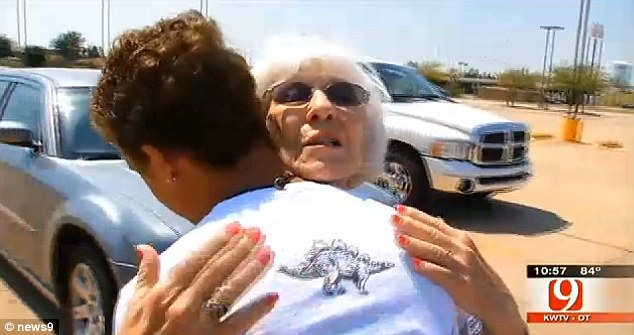 Turning the other cheek: Despite his father's mugging, Tona Herndon insisted that Christian was from a 'blessed family' and the two hugged again