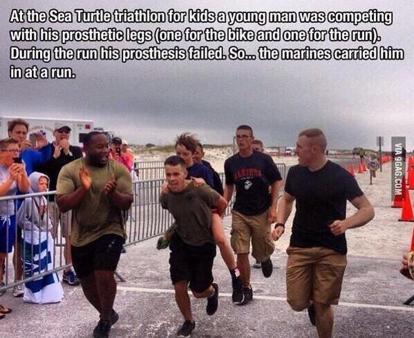 triathtlon - marined carrying boy