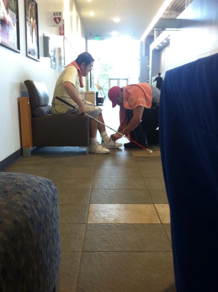 tieing a blind man's shoes