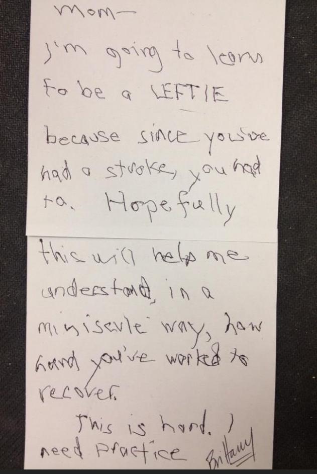 a little girl writes to her mum, who has just had a stroke, about practicing left handed writing
