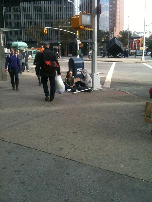 "This girl just decided to sit next to a homeless man and they just chilled out for a while."  (Photo/story via trebledlittlesoprano.tumblr.com)