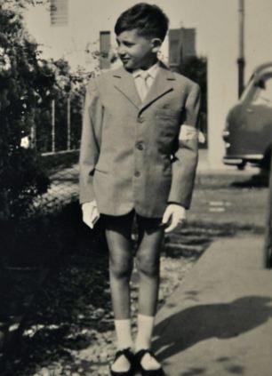 Tough life: Vinicio as a young boy before his condition fully developed  