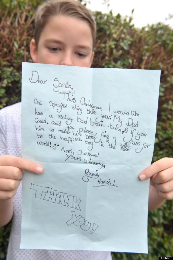A BOY of 10 has written a heartbreaking letter to Santa asking him to cure his dad of a deadly brain tumour. Ronnie Harris has told Father Christmas hes just got one wish this year  to make his father, Russell Harris, 32, better, as he fights for his life. The big-hearted youngster does not ask for a single present or treat from Santa. Amazing Ronnie said hed be the happiest boy in the whole world if Father Christmas could make his poignant dream come true. His mum, Emma Harris, 31, found the tear-jerking letter under her sons bed  and burst into tears with sheer pride and emotion. Mrs Harris, of Ipswich, Suffolk, said: I didnt even know he had it. I was just cleaning Ronnies bedroom when I found it shoved under his bed. I was very touched. It was heart-wrenching to think that a child of his age doesnt want anything for himself for Christmas. Powerful words - Ronnie holds up his very special request to Santa.
