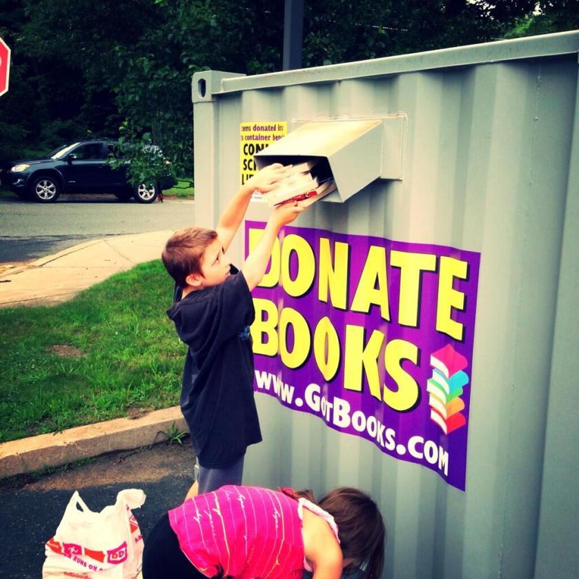 kids donating books for ther kids - kindness