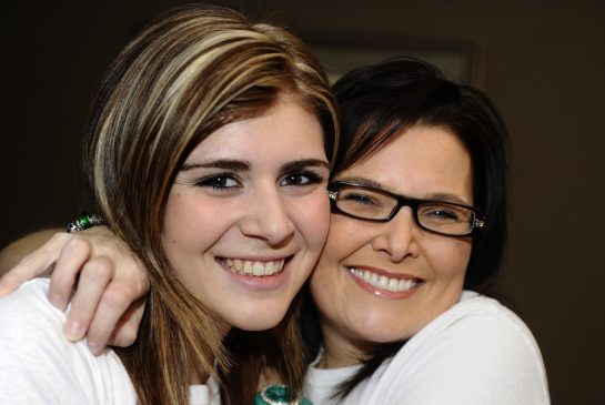   Colin McConnell / Toronto Star Order this photo  Neighbours Renee Ly, right, grabs neighbour Erica Tomlinson, who gave Ly a new lease on life when she gave her neighbour 70 per cent of her liver.