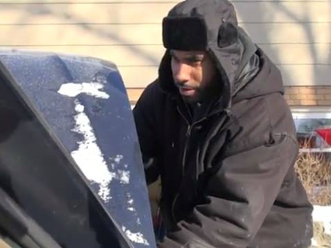 Brad McKorical kindly offers his help to help people jump start their cars - illinois