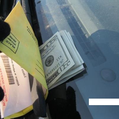 Found this parking ticket for $100.00 paid by a complete stranger. Faith in humanity restored!