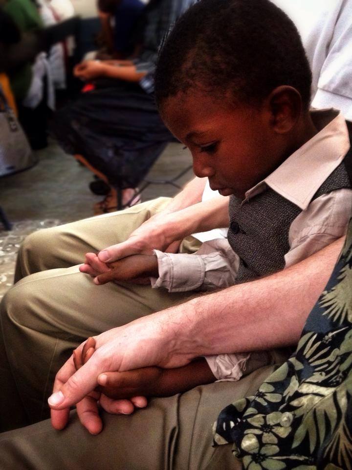 My Father is in Haiti right now. He attended a Creole service this morning when this boy sat between him and his friend without saying a word.