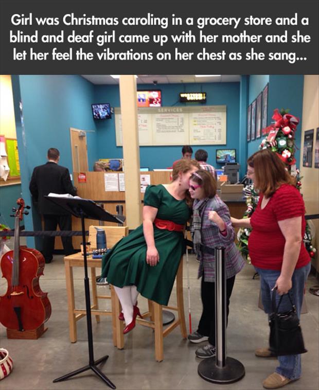 blind and deaf girl listens to vibrations of someone singing