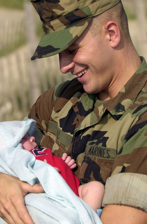 A marine meets his infant son.