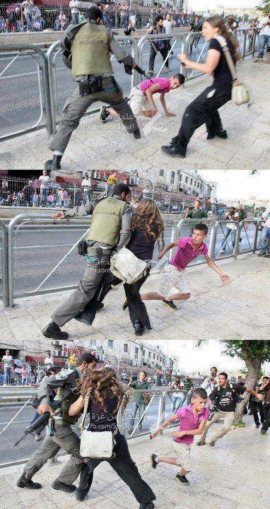 An Israeli woman protects a Palestinian boy from an Israeli soldier.