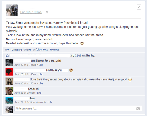 giving bread to a homeless person