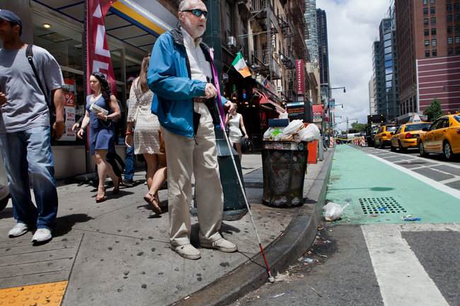 blind man crossing road
