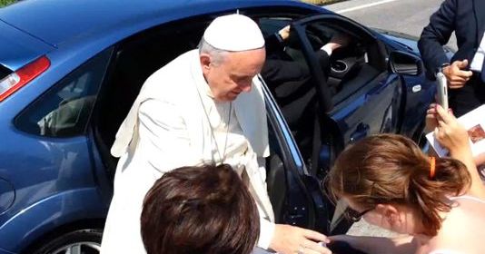 Pope Francis has his Car Stopped and Gets out to bless a Disabled Woman