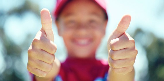 Boy with thumbs up