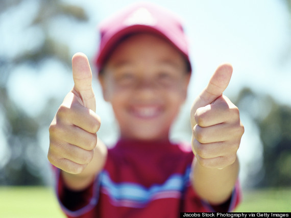Boy with thumbs up