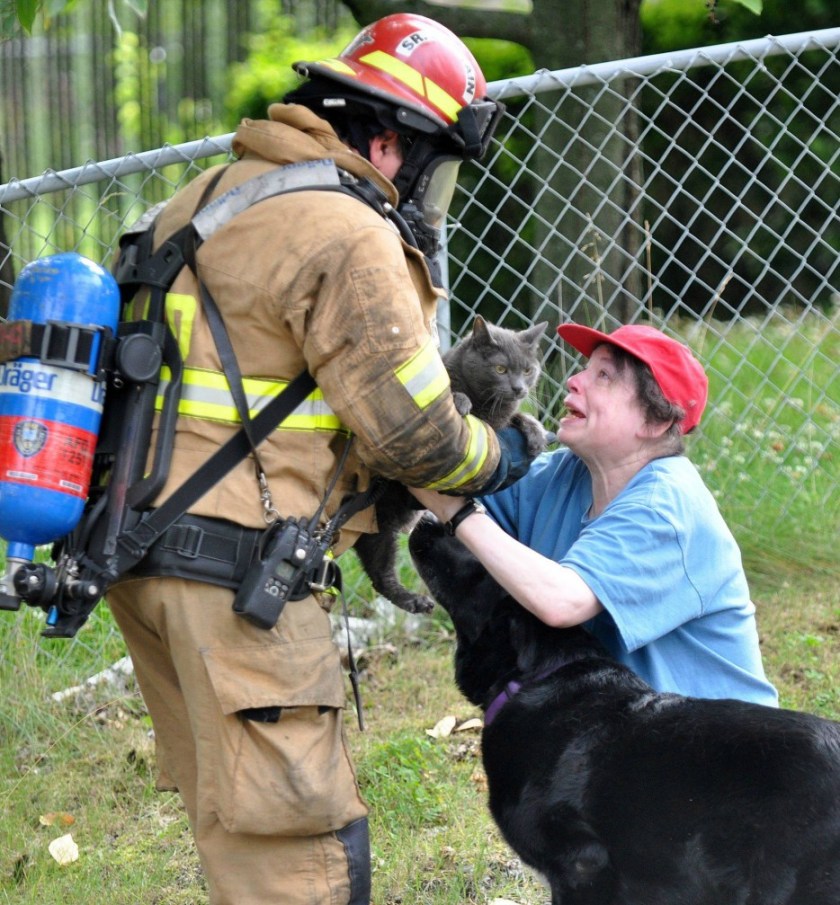 The firefighter who risked his life to save a woman's frightened cat..jpg