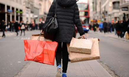 woman carrying shopping bags