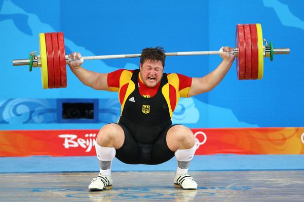 Matthias Steiner of Germany attempts a lift during the Men's 105 kg group weightlifting event.