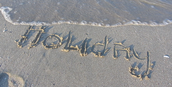Holiday Written in Beach Sand preview image