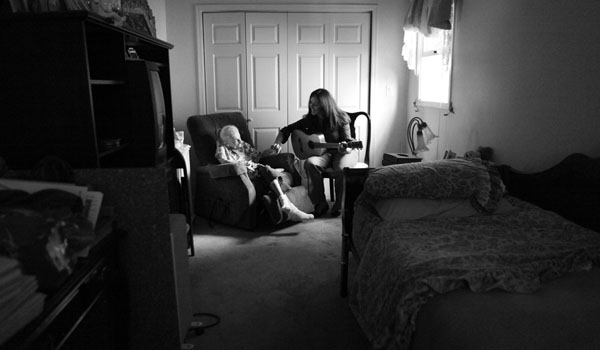 For the last four months, Charla Burton, another therapist, has been visiting Rose Vuolo, 86, an Alzheimer’s patient.