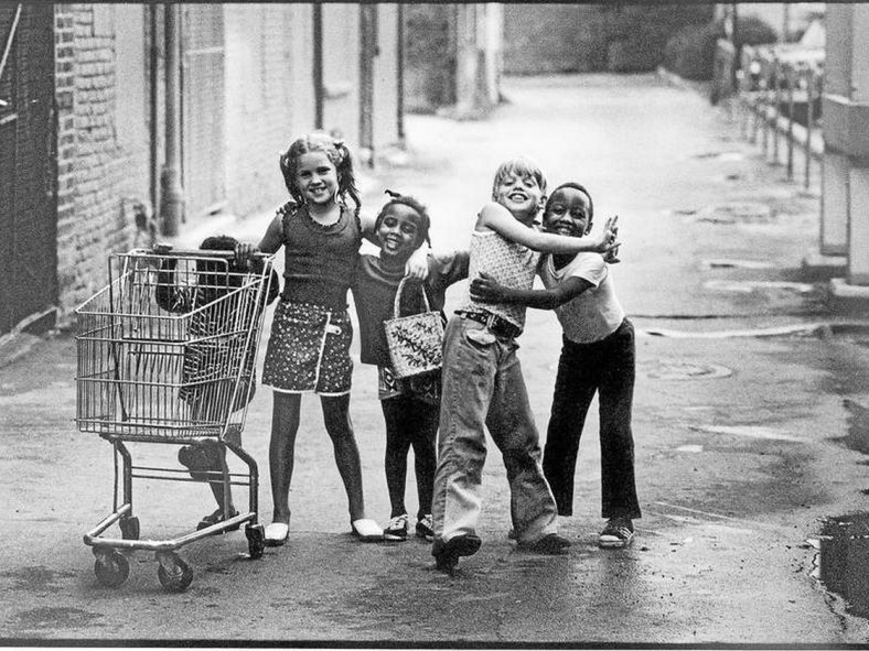five young friends in a rain-washed alley in downtown Mount Clemens