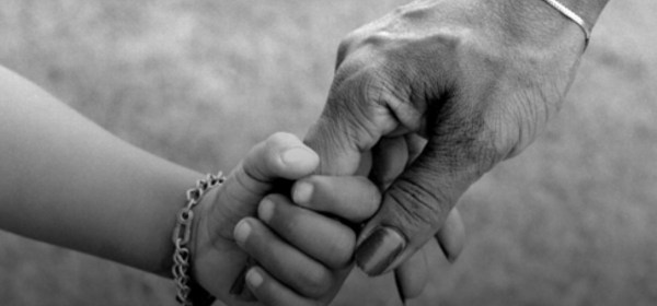 mother holding hands