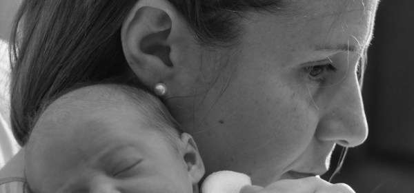 mother with newborn tired wallpaper