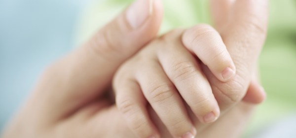 mother holding hands