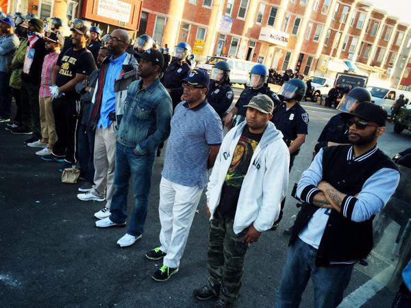 Citizens lining up to protect Baltimore Police.