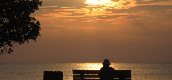 woman sat on a bench