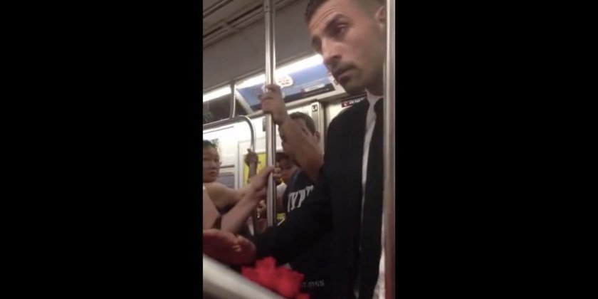 Handsome Stranger Makes a Woman Cry on the Train (Video)
