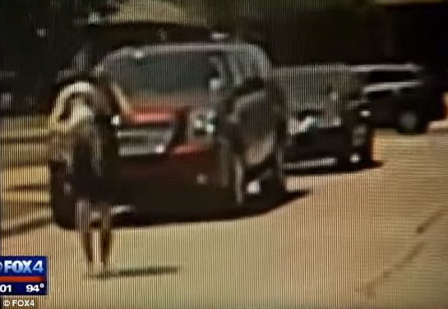 This video frame shows an unresponsive Bexley in her mother's arms after choking on a coin